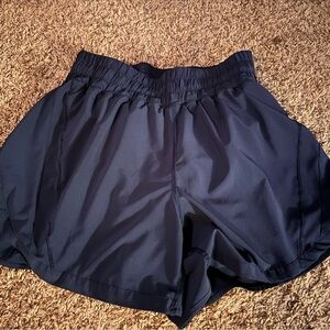 Lululemon size 8 navy track that shorts